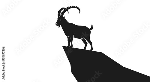 Goat standing on mountain peak 1.
