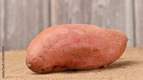 video of a raw sweet potato