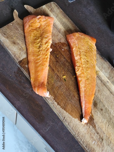 smoked salmon on a wooden board