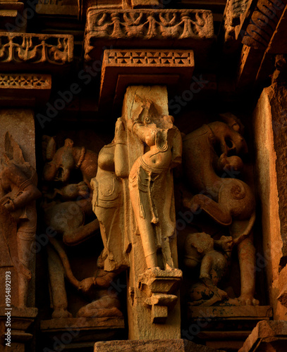 Stone carving sculptures on Khajuraho Temple, a UNESCO world Heritage site, India.