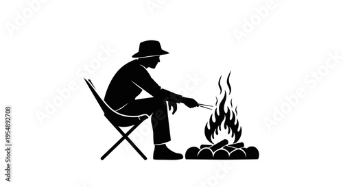 Silhouette of a Person Relaxing by a Campfire