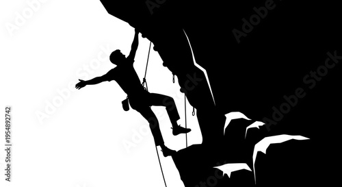 Silhouette of a Rock Climber Reaching the Summit