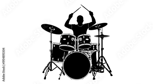 Silhouette of a Drummer Playing a Drum Kit