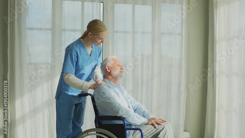 Help support retirement healthcare. Nurse helping old man in wheelchair. Patient and woman in nursing home for medical caregiver. Nurse taking care of paralyzed man in chair for people with disability