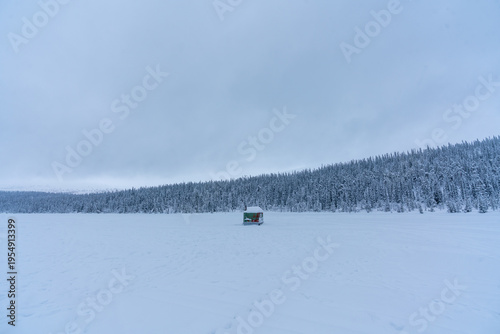 Frozen lake with mountain view