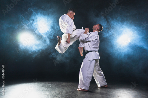 Fotografía Martial arts masters on dark background