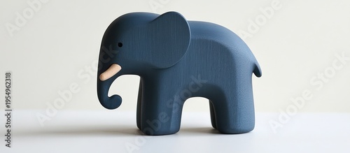 Dark blue elephant figurine, simple background, children's room decor