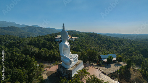 Photography Wat Phra That Pu Jae is a historic mountain temple in Rong Kwang District, Phrae, recognized as a national archaeological site