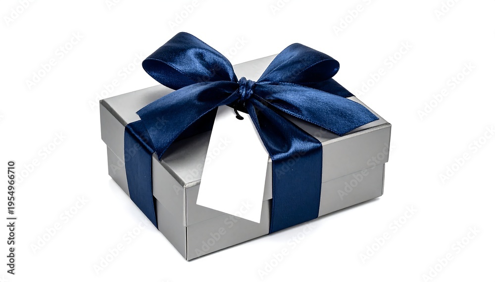 Obraz premium Elegant silver gift box with dark blue ribbon bow photographed from a low angle on a white backdrop