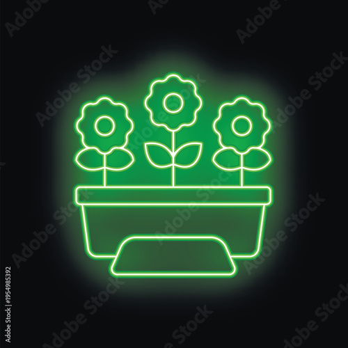 Green neon sign depicting three flowers growing in a planter on a black background