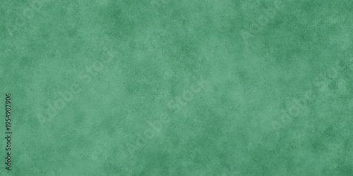 Abstract Elegant dark green background with mottled vintage texture in old fancy background design, texture of colored parchment paper.