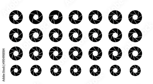 A collection of small black circles on a white background.