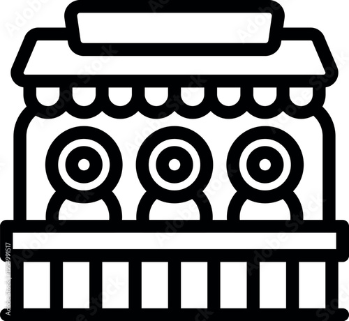 Carnival game operators waiting for players at shooting gallery booth