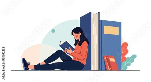 Young woman sitting on the floor and reading a favorite book while leaning against a giant stack of large academic books.