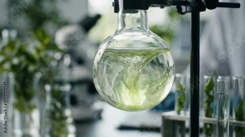 Wallpaper Mural Eco friendly solvents green chemistry lab flask with swirling plant extract glassware solution mixing test tubes and clear green extract creating Torontodigital.ca