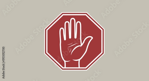 A red stop sign with a raised hand is displayed prominently outdoors.