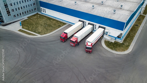 Fotografie trucks are loaded in a modern logistics center