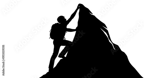 Silhouette of a Hiker Reaching the Mountain Peak
