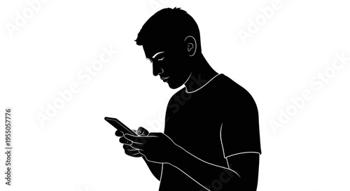 Silhouette of a Young Man Using a Smartphone