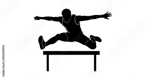Silhouette of an Athlete Jumping Over a Hurdle
