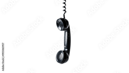 Fotografía Isolated black vintage telephone receiver hanging by its coiled cord, old commun