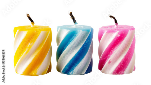 Fotografie Isolated three colorful spiral birthday candles with melted wax and burnt wicks,