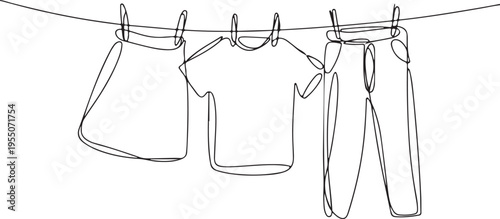 Laundry hanging on a clothesline single line drawing