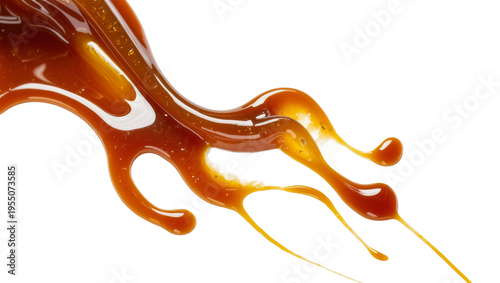 Bild auf Leinwand Isolated flowing caramel sauce with artistic drips and abstract curves, a delici