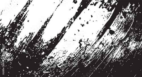 Grunge textured brush strokes with splatters and scratches on white and black background