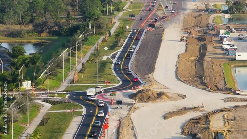Industrial roadworks. Roundabout on wide American highway under construction. Development of transportation system for rapid transit.