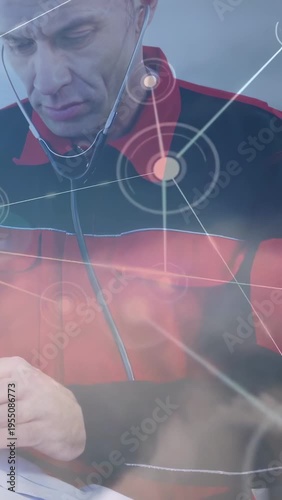 Vertical video: Male medic with steth