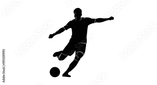 Silhouette of a Soccer Player Kicking a Ball