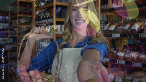 Vertical video: Camera moving shopclerk in apron offering egg to viewer with wicker basket overlays
