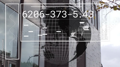 Reflective globe receiving HUD overlay after auto tech scan, showing numeric readouts and rotating