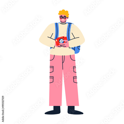 An young man holds a camera. Tourism concept.