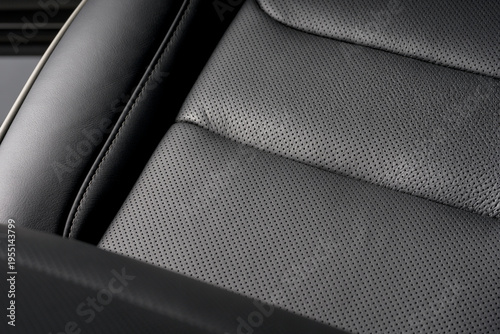 Closeup shot of the black seat surface for driver inside a car