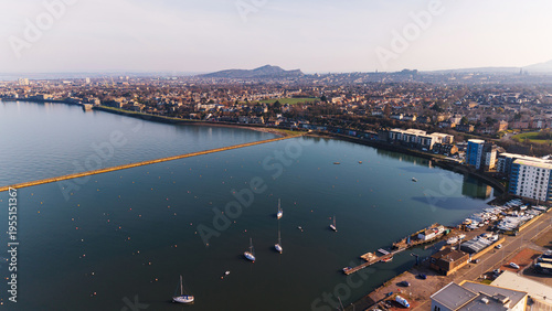 Photos Sea view of Edinburgh skyline and Granton harbor with sailing boats and yachts