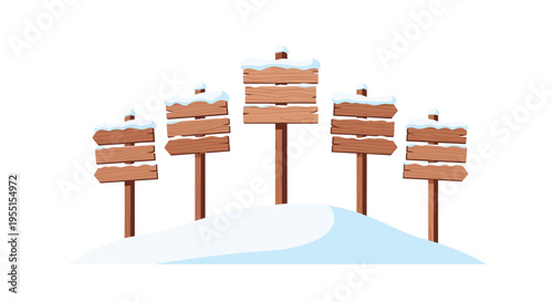 Snow-covered wooden signposts on winter hill