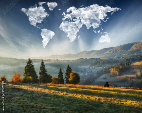 clouds in the form of a map of the world over the mountains. autumn dawn in the Carpathians. Travel and landscape concept 