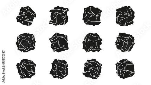 Collection of crumpled paper balls in black and white.