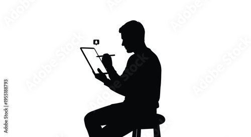 Silhouette of a male graphic designer drawing on a digital tablet with stylus pen, creative work concept