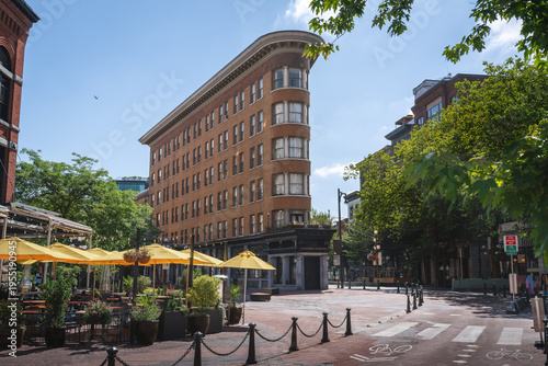 Maple Tree Square in Gastown historic neighborhood with flatiron building - Vancouver, British Columbia, Canada