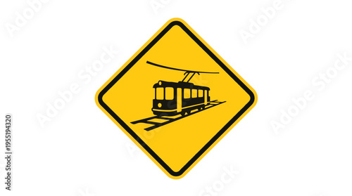 A yellow diamond warning sign featuring a black silhouette of a tram on tracks with an overhead line, indicating a tram crossing or tramway ahead.