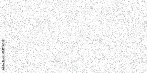 Abstract speckled background with a uniform distribution of tiny grey and white irregular polygons creating a frosted textured surface for creative projects