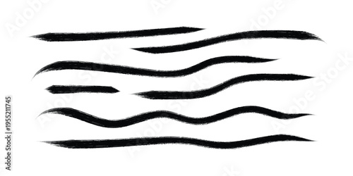 Thin black ink brush strokes set with elegant wavy lines and artistic paint smears for creative decoration and calligraphic design elements on transparent background for versatile usage