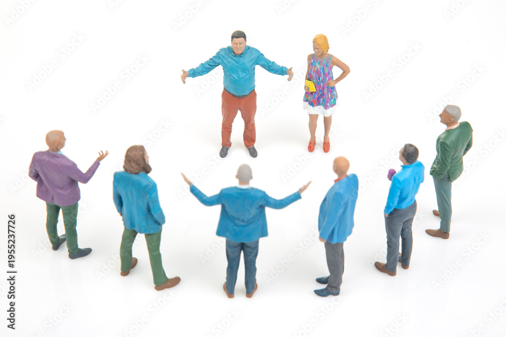 Naklejka premium Group of miniature people interacting in a circle during a discussion at a casual gathering in a bright setting