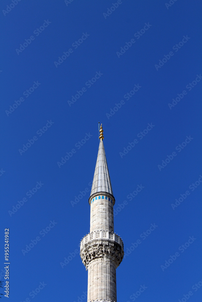 Fototapeta premium Exterior of Sultanahmet Mosque Window Minaret September 2024 Famous religious landmark with white stone walls Istanbul