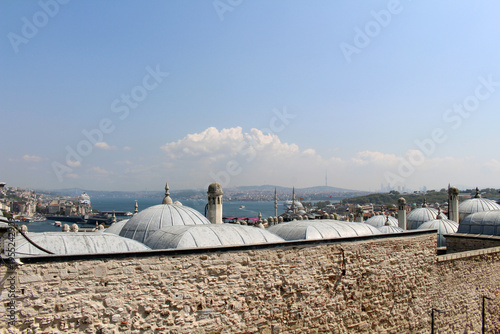 Ancient Ottoman mosque lead domes September Summer 2024 Bosphorus sea view and city skyline Istanbul