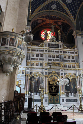 Hagia Triada Greek Orthodox interior September Summer 2024 White ornate iconostasis and blue ceiling Istanbul