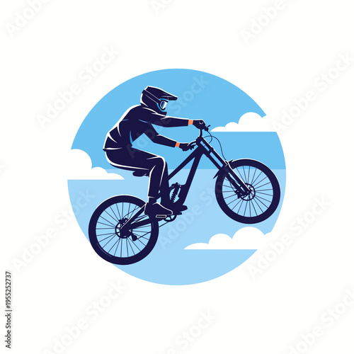Dark silhouette of cyclist performing mid air mountain bike jump
